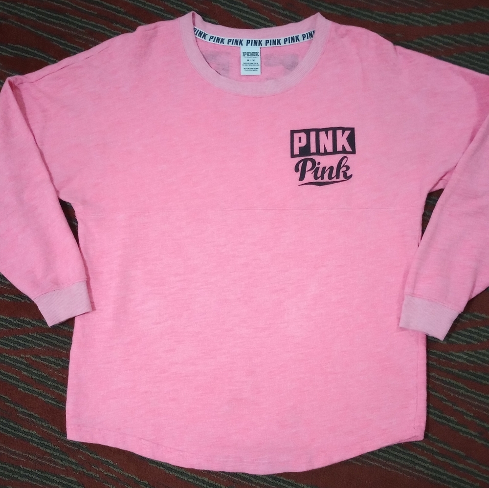 Pink sweatshirt, size medium, like new and pink in color